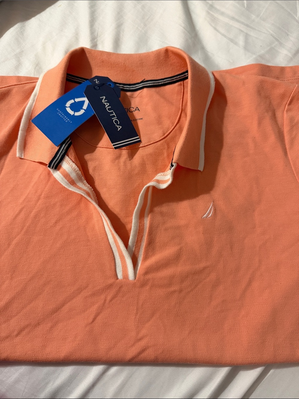 Nautica Women’s Coral Polo with White Trim and Sail Logo